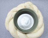 A picture of step 9 of Fluffy Powdered Snow Christmas Bread Wreath.