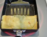 A picture of step 4 of Egg and Cheese Sandwich.