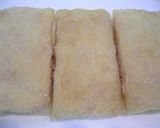 A picture of step 5 of Simmered Aburaage Filled with Ground Chicken and Tofu.