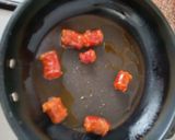 Foto del paso 2 de la receta: Huevos rotos con chistorra