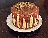 A picture of step 14 of Chocolate Pumpkin Layer Cake.