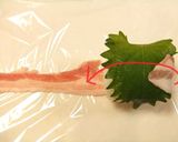 A picture of step 3 of "Samurai Warrior" Shiso and Meat Wrapped Onigiri.