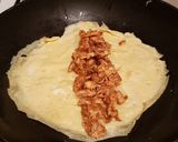 A picture of step 9 of Curry Chicken Egg Cheese Tortilla Wrap.