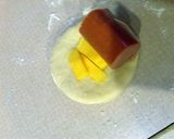 A picture of step 3 of Pigs In A Blanket.