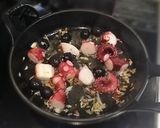 A picture of step 4 of Basil-Scented Aglio e Olio with Octopus and Olives.