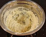 A picture of step 3 of Cherry Thumbprint Cookies.