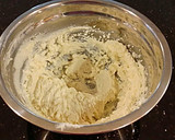A picture of step 3 of Cherry Thumbprint Cookies.