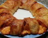 Foto del paso 8 de la receta: Rosca de salchichas y queso cheddar