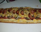 A picture of step 5 of Alfrado French bread pizza.