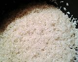 A picture of step 1 of Olive rice and malta with black beans.