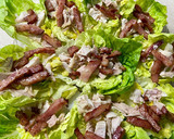 Foto del paso 2 de la receta: Wraps o tacos de hojas de cogollos con ensalada César