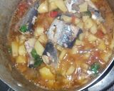 A picture of step 1 of Jallof potatoes with fish.