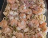 A picture of step 4 of Shrimp n Scallop pasta w/ White Wine sauce.