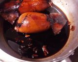 A picture of step 8 of Self-braising Scrumptious Rice Stuffed Squid.