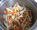 A picture of step 7 of Comforting Simmered Daikon Radish, Carrot and Aburaage.