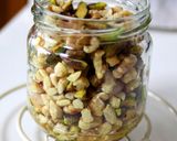 A picture of step 2 of Honey Marinated Roasted Nuts.