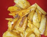 A picture of step 3 of Rosemary baked potato wedges.