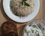 A picture of step 6 of Qeemay rice with shami kabab and vegetables salad.