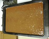 A picture of step 5 of Grandma's Minty Texas Sheet Cake.