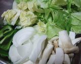 A picture of step 1 of Spring cabbage and pork stir-fry with miso and oyster sauce.