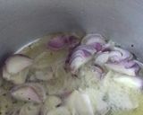 A picture of step 2 of Orange pulao.