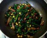 A picture of step 7 of Butter-Sautéed Spinach with Caramelized Soy Sauce.