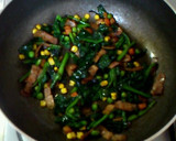 A picture of step 7 of Butter-Sautéed Spinach with Caramelized Soy Sauce.