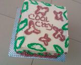 A picture of step 10 of Vanilla & chocolate marble Christmas themed cake.