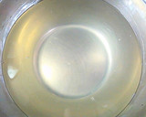 A picture of step 1 of Fluffy Egg-Drop Soup with Boiled Chicken Broth.