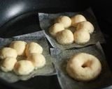 A picture of step 8 of Chewy and Moist "Pon-de-Ring" Doughnuts.
