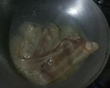 A picture of step 1 of Fried bacon and egg with hot drinking chocolate.