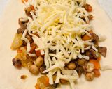 A picture of step 4 of Japanese-Style Calzone with Roasted Soybeans & Curry.