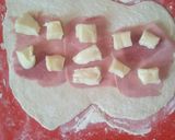 Foto del paso 4 de la receta: Pan relleno con jamón y queso