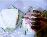 A picture of step 3 of Tuna and mayonnaise sandwich, cheese, pickles.
