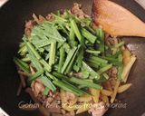 A picture of step 8 of Pork, Chinese Chives, and Potato Summer Curry Stir-Fry.