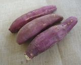 A picture of step 1 of Buttered Sweet Potatoes with Sweet Red Beans and Vanilla Ice Cream.
