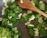 A picture of step 3 of Spinach omelet in a bun.