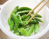 A picture of step 4 of Speedy and Easy Sugar Snap Peas and Grated Cheese.