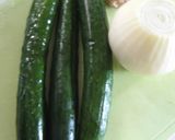 A picture of step 1 of Easy and Colorful Yellow Cucumber and Onion Pickles.