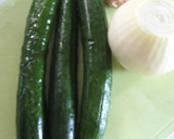 A picture of step 1 of Easy and Colorful Yellow Cucumber and Onion Pickles.