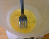 A picture of step 3 of Low calorie courgette mini quiche with cheese straws.