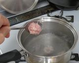 A picture of step 4 of Tsukune Winter Melon Soup.