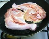 A picture of step 1 of Christmas Chicken in a Frying Pan.
