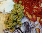 A picture of step 2 of Individual Pita Pizzas!!!🍕.