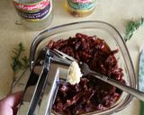 A picture of step 3 of Sun dried tomatoes and Olive bread dip.