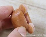 A picture of step 8 of Charaben Rilakkuma made from Mini Sausages.