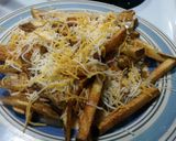 A picture of step 8 of Home made cheese fries.