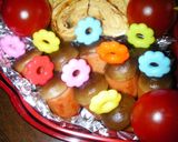 A picture of step 6 of Bento Acorns with shimeji mushrooms and wiener sausages.