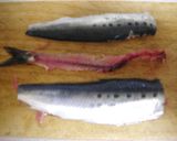 A picture of step 1 of Grilled Sardine Rolls with Umeboshi and Shiso Leaves.