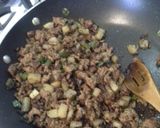 A picture of step 10 of Potato and Ground Beef Burritos.
